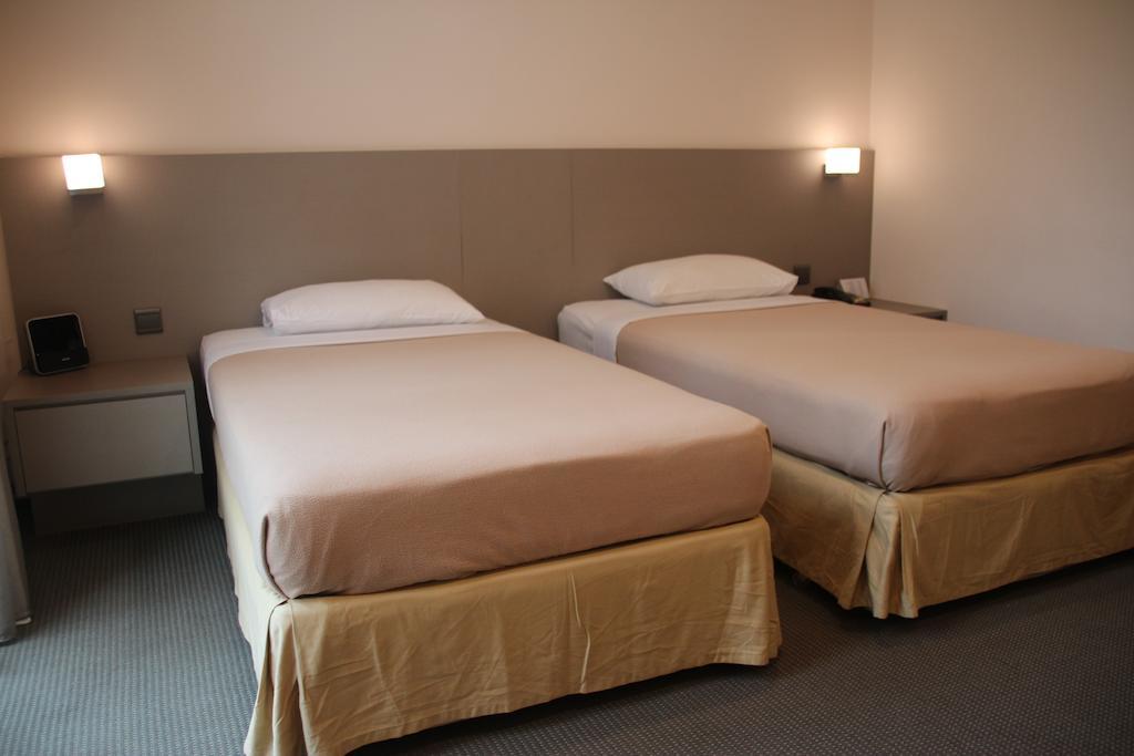 Classique Hotel Singapura Quarto foto